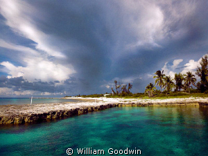 Storm approaching the Pool at Bucaneer, Cayman Brac by William Goodwin 